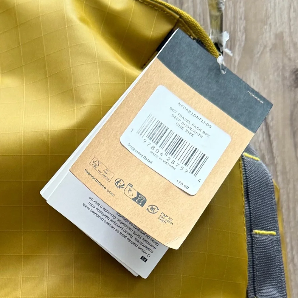 The North Face Men's Yellow Backpack with Gray Accents